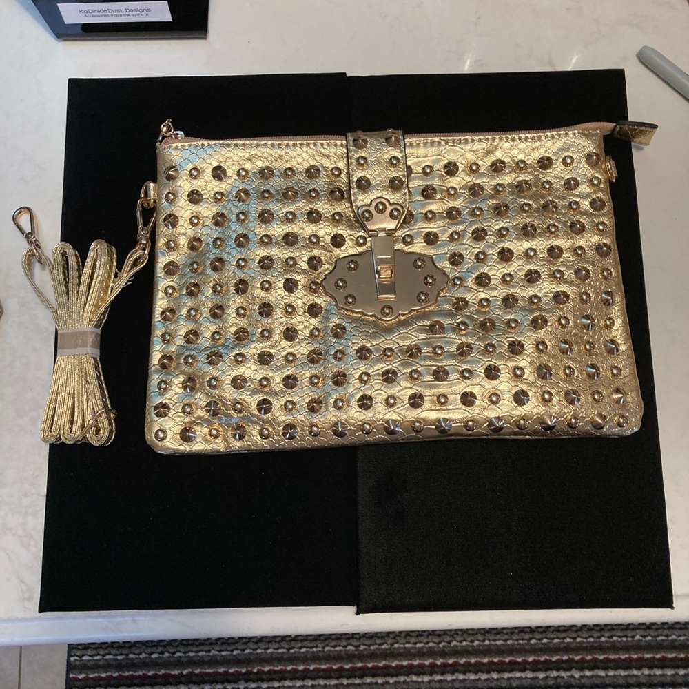 CARLO G STUDDED Envelope clutch. Faux snake in gold with shoulder strap